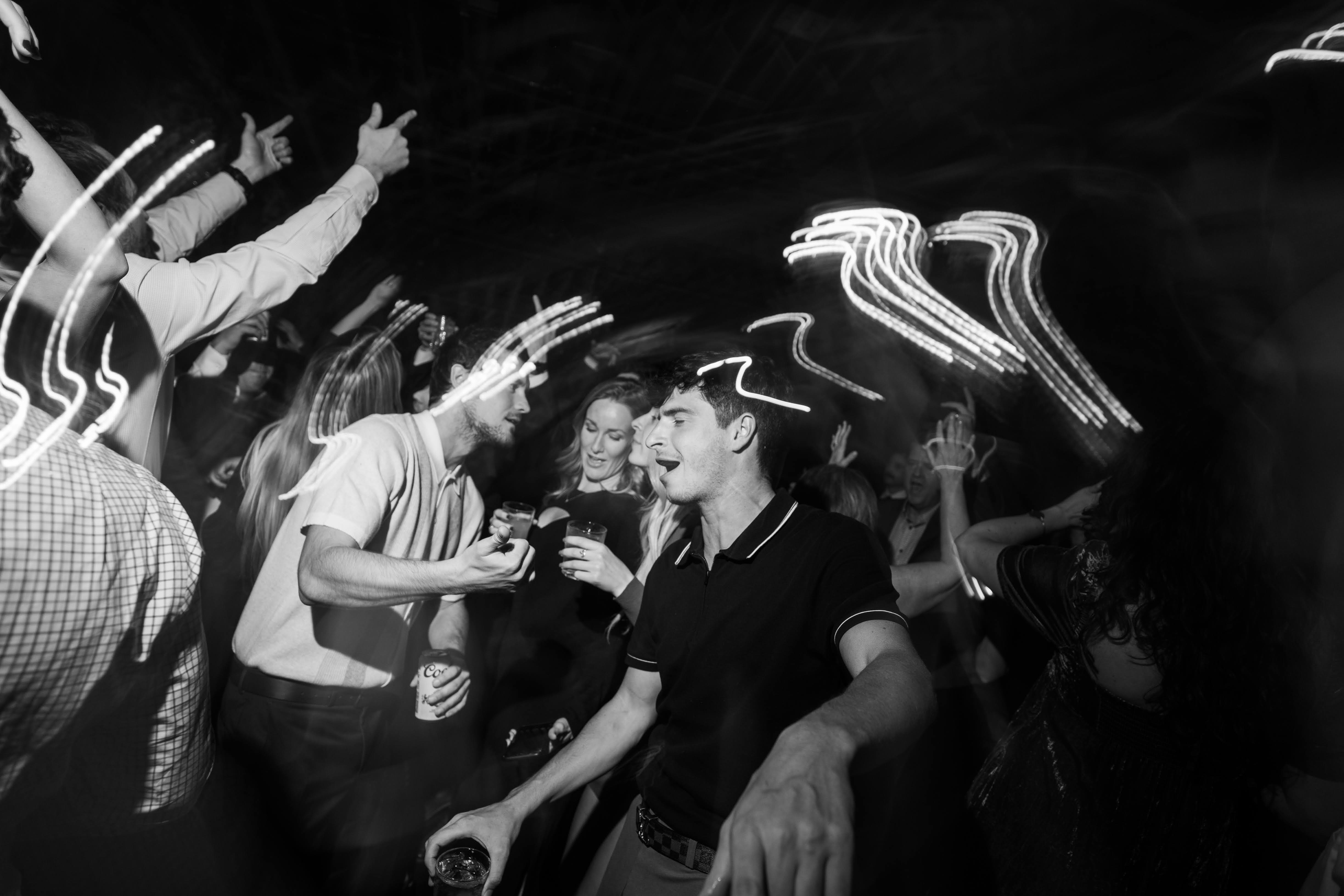 Black and white wedding dance floor with light trails Denver Colorado