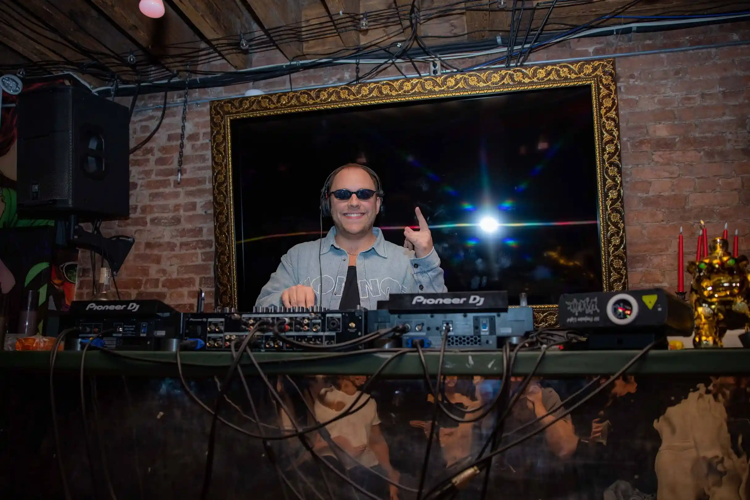 Josh Torrison DJing behind the booth in New York City